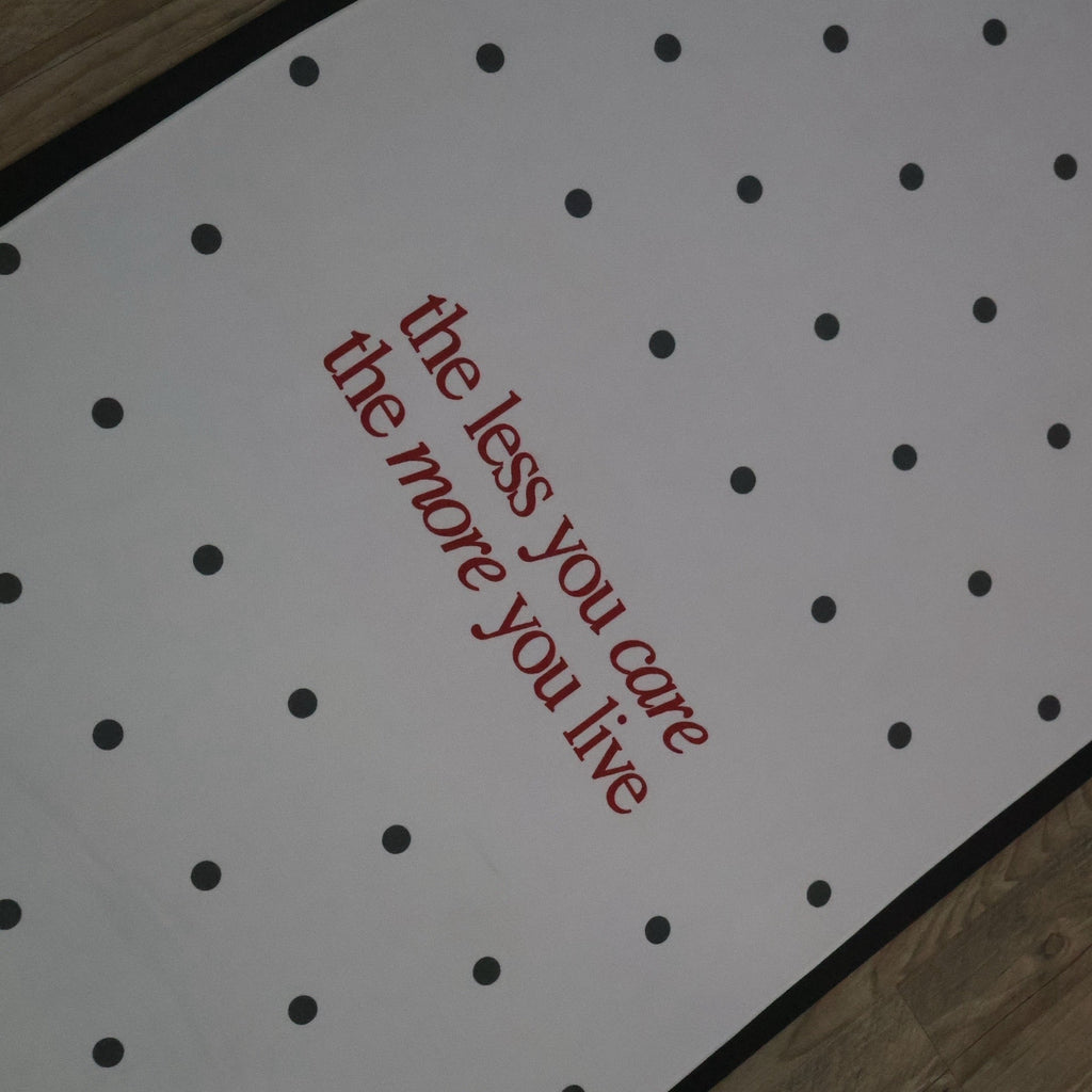 Muse yoga and Pilates towel with black polka dots and red quote detail